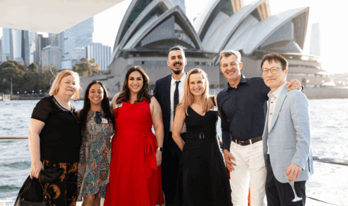 OBS Team with the sydney opera house background